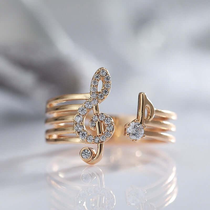 Anel Clave de Sol feminino dourado