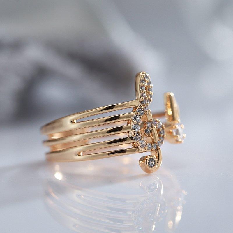 Anel Clave de Sol feminino dourado - Oasis Wiki